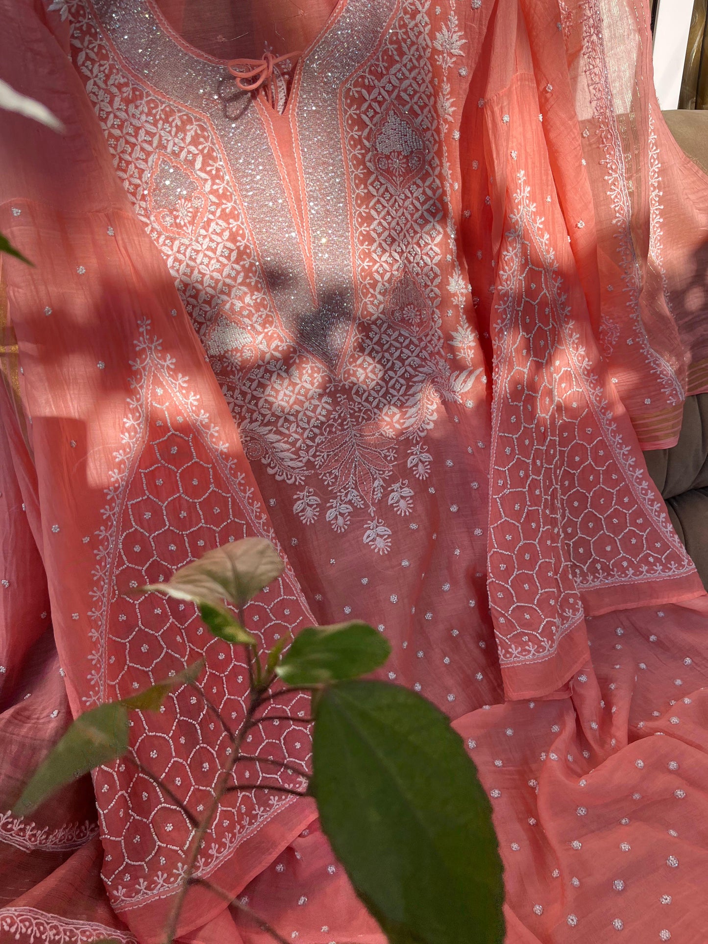 Peachish Orange Mulmul Ensemble Chikankari Elegance with Cutdana & Pearl Highlights