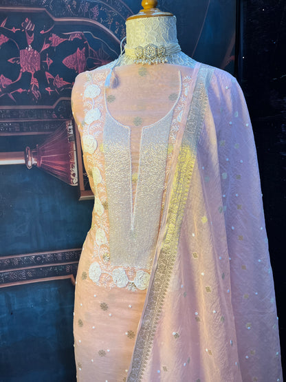 peach kurta set with Cutdana and Moti work