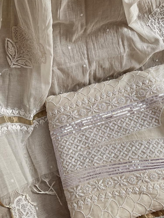 Ivory Elegance: Semi-Stitched Mulmul Chikankari Ensemble with Pearls & Cutdana