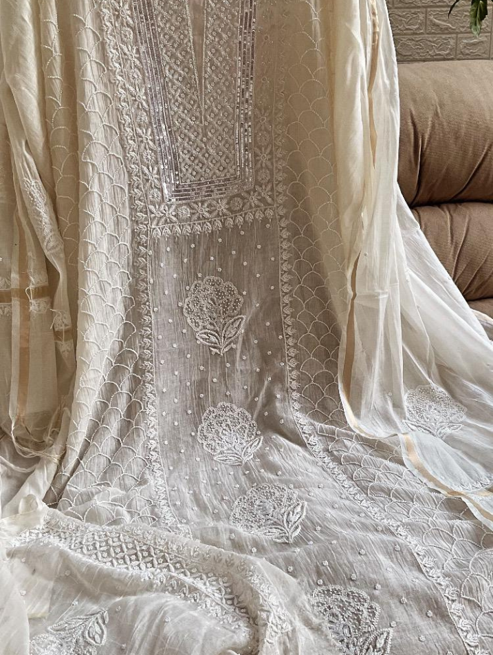 Ivory Elegance: Semi-Stitched Mulmul Chikankari Ensemble with Pearls & Cutdana