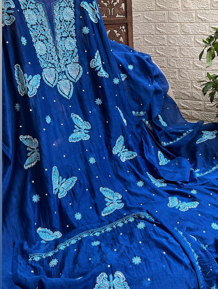 Subtle Grace in Pure Mulmul – A Whimsical Handcrafted Ensemble