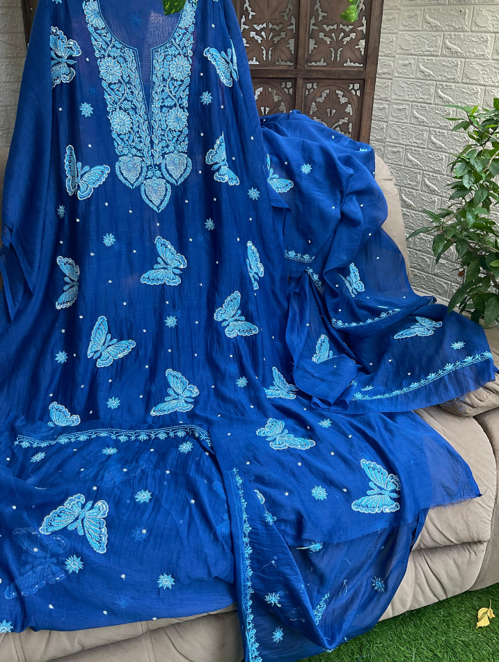 Subtle Grace in Pure Mulmul – A Whimsical Handcrafted Ensemble