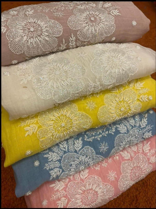 Refined Radiance: Mulmul Chikankari Set with Pearls, Cutdana & Cotton Bottom