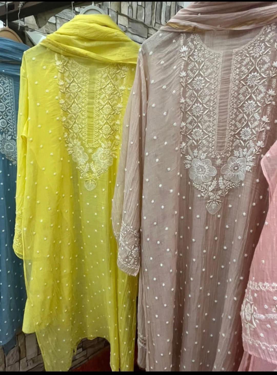 Refined Radiance: Mulmul Chikankari Set with Pearls, Cutdana & Cotton Bottom