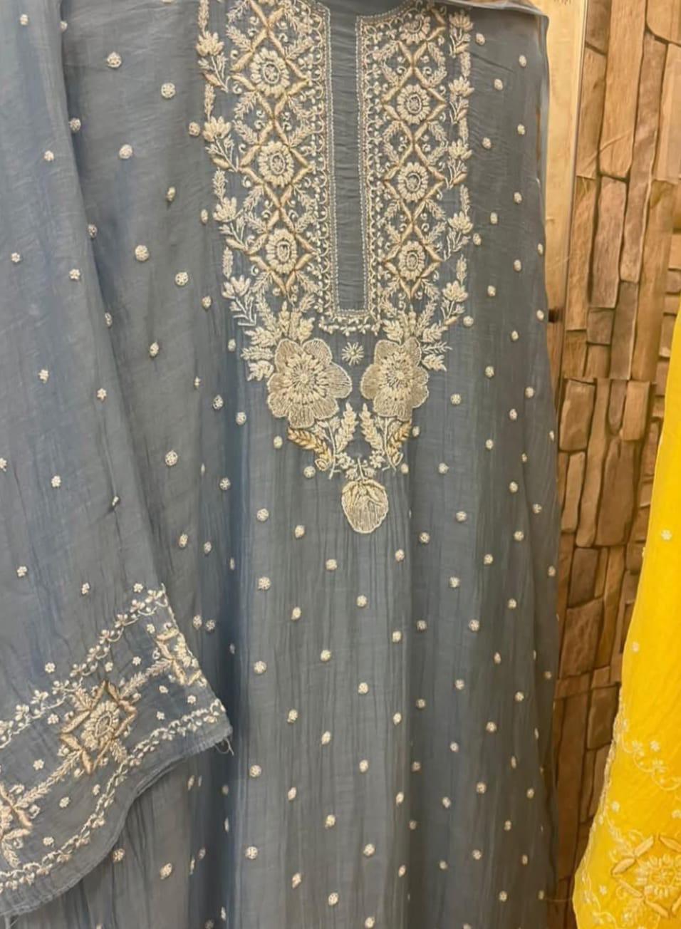 Refined Radiance: Mulmul Chikankari Set with Pearls, Cutdana & Cotton Bottom