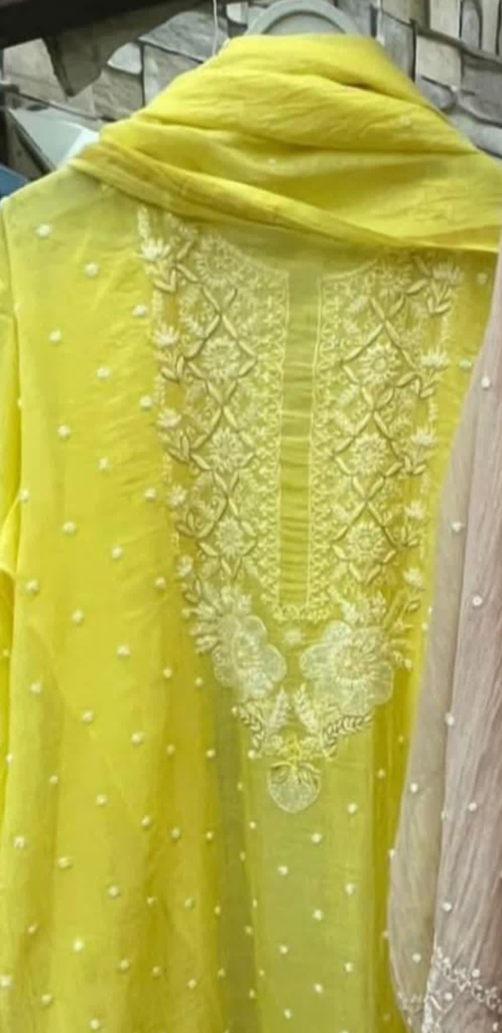 Refined Radiance: Mulmul Chikankari Set with Pearls, Cutdana & Cotton Bottom