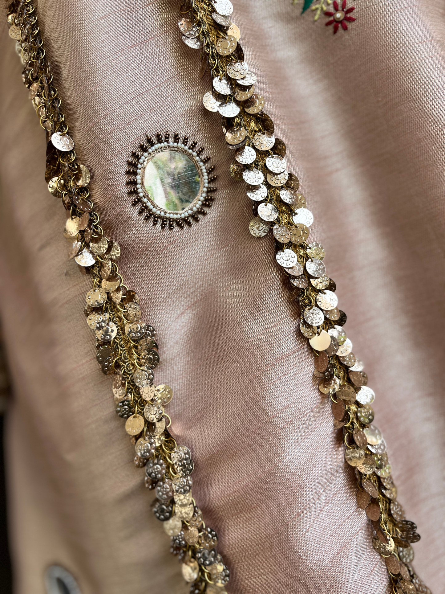 kurta is paired with a graceful sharara and dupatta