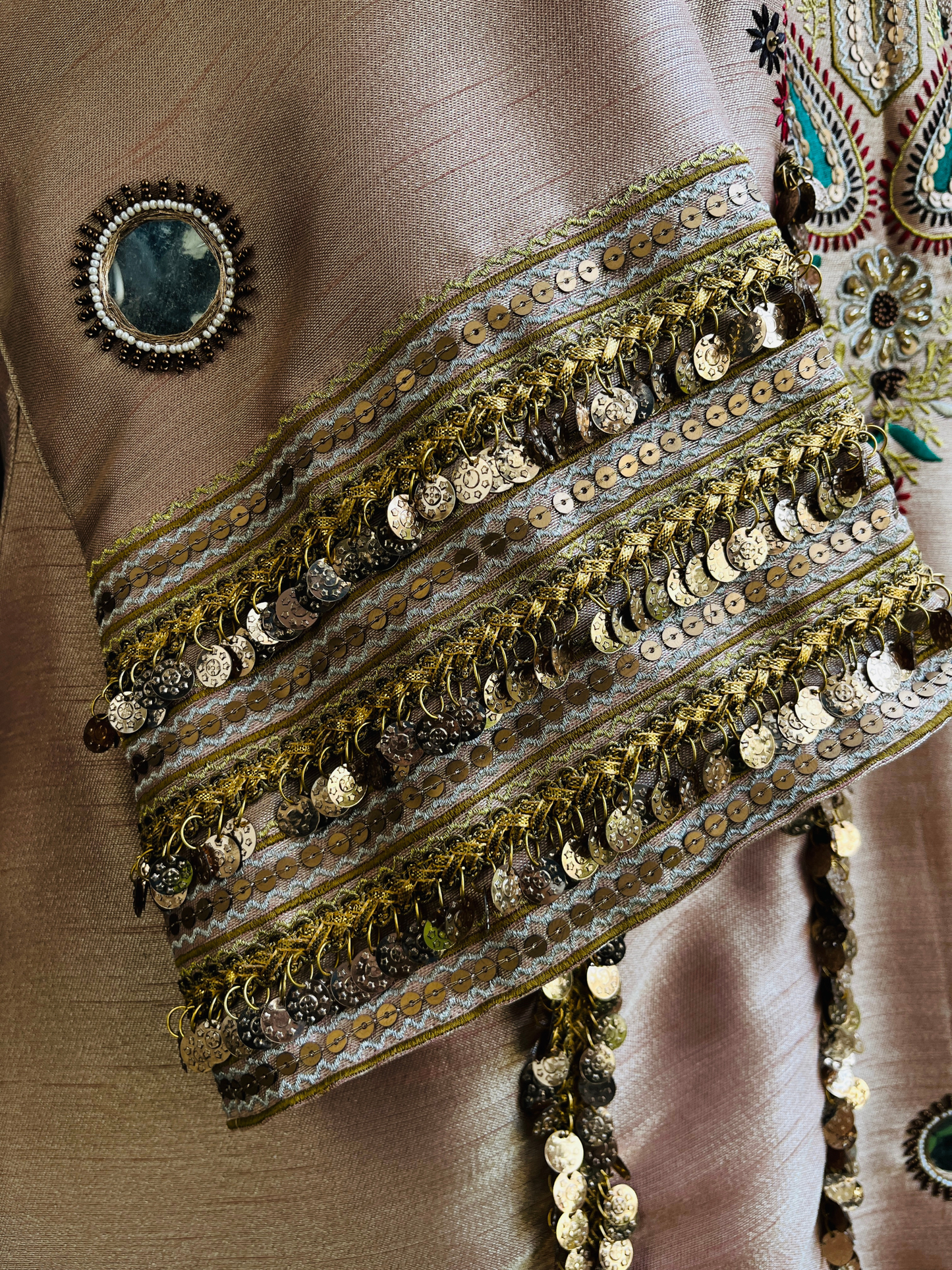 kurta is paired with a graceful sharara and dupatta